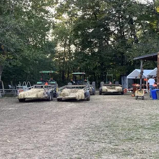 several vehicles parked in a field