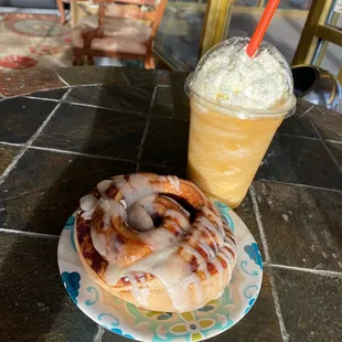 a glazed donut and iced coffee