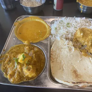 Vegetable Korma, vegetable Sabzi, basmati rice, naan.