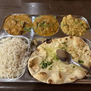Butter Chicken, Veg Korma, Punjabi Kadhi, Garlic Naan, Rice