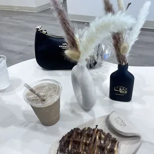 Croffle and latte on table