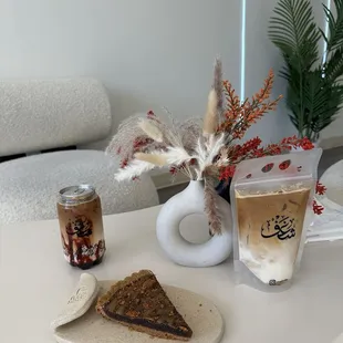 Date latte (left) in can, habibi latte (right) in pouch, and Shaghf tart