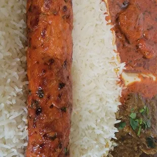 a plate of rice and meat