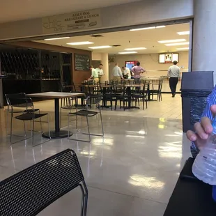 a man holding a bottle of water