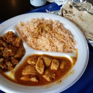 Chicken Masala, Aalu Palak, Basmati Rice. Side of Roti.