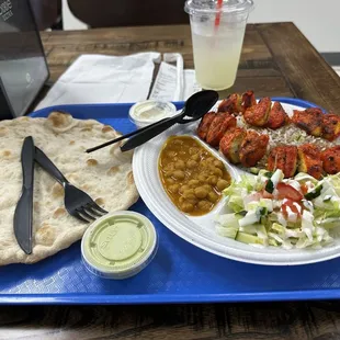 a plate of food on a blue tray