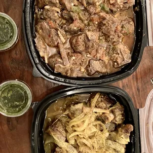 two containers of food on a table