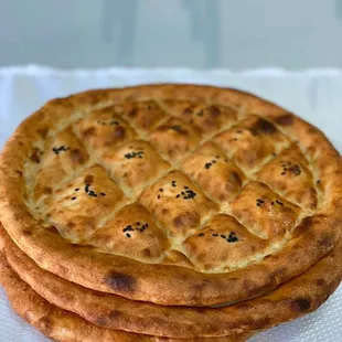 a stack of four flatbreads