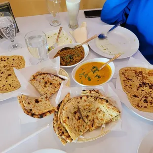 Ensemble of breads. Onion kulcha takes the cake