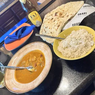 Chicken Madras, rice, naan, and Tak Mahal beer