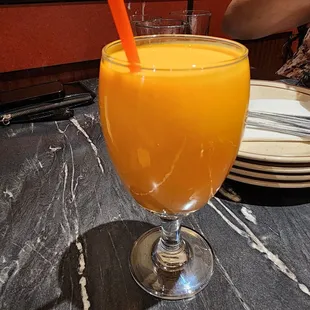 a glass of orange juice