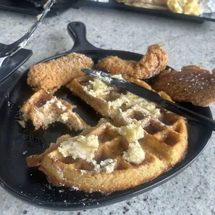 It comes buttered with syrup. Breading on chicken thick.