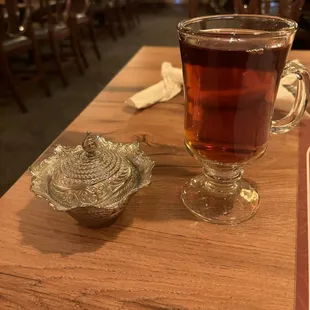 Hot tea with sugar cubs