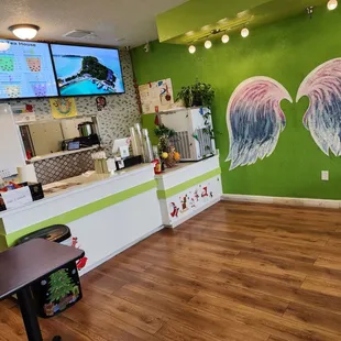 I love the wings on the wall. Super cute