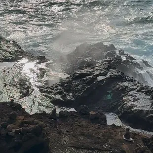 A Blow Hole in the Rocks at a Beach