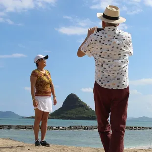 Posing for photos at Chinaman's hat on our Private Tour.