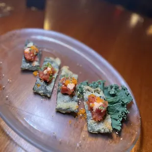 a plate of sushi on a table