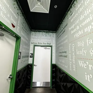 Very clean hallway to the restrooms with uplifting sayings on the walls