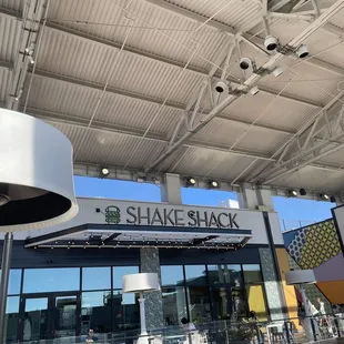 the entrance to shake shack