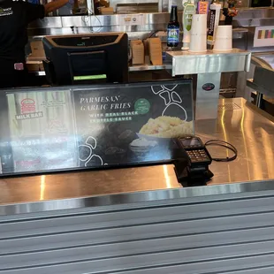 Cashier stand...beer taps were out of order so beer not available at this location