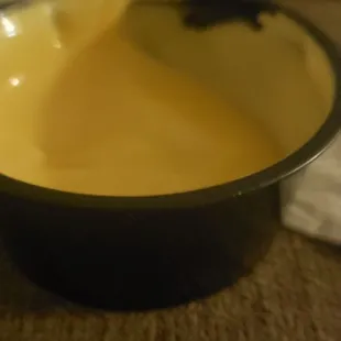 Half a container of cheese.