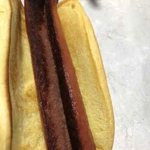 Vienna dog sliced and partially "charred"
