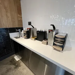 a counter with a variety of items on it