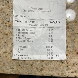 $36 for 2 tiny burgers, 2 small drinks and 1 French Fry order at a fast food restaurant.