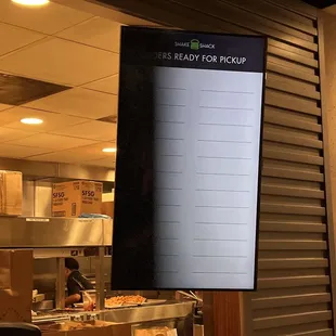 a menu board in a restaurant