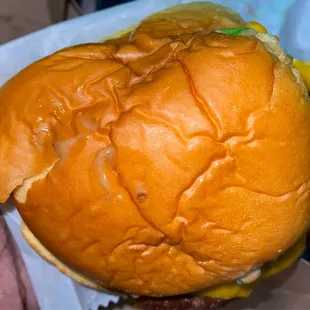 a burger with a bite taken out of it