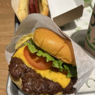 Shake Shack cheeseburger. Yum! Don't get confused with the cheeseburger menu option. Two different burgers.