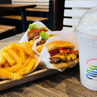 a tray of fries and a cheeseburger