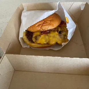 Tiny cheeseburger from Shake Shack.  No where near worth the money.