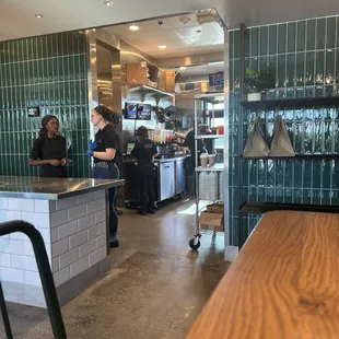 a view of the kitchen from the dining area