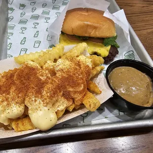 a tray of fries and a hamburger