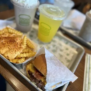 Shake Shack cheese burger with Carolina BBQ season cheese fries and a Oreo cookie milkshake