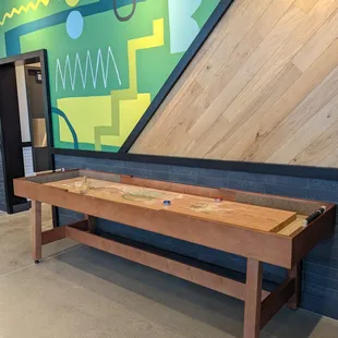 A game table for entertainment and a chance at community.