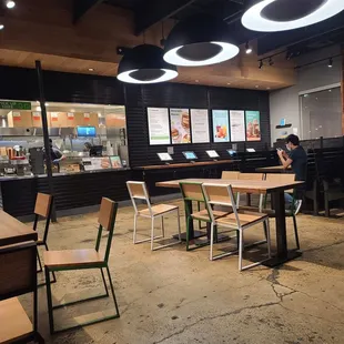 Order area,  with attendant at counter or on the pads provided.