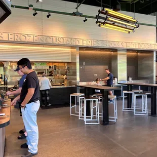 a man standing at the counter