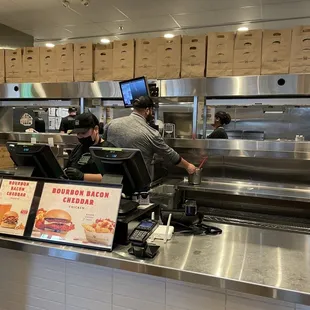 a man working behind the counter