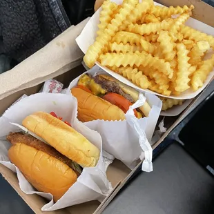 two hot dogs and french fries