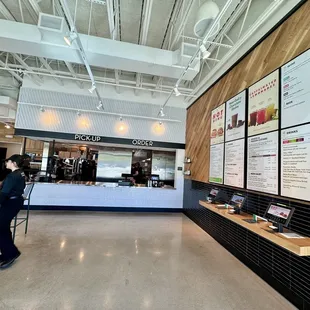 a man standing in front of a counter