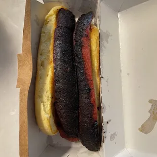 Burnt hotdog. How can anyone eat that? Completely unacceptable.