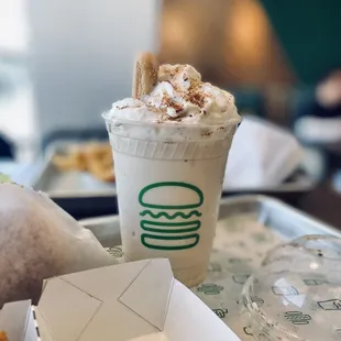 a cup of coffee and donuts