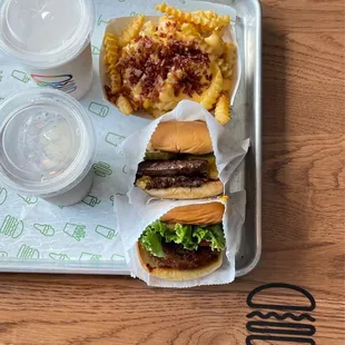 Cookies &amp; cream shake, strawberry shake, bacon &amp; cheese fries, Lockhart Link Burger, &apos;Shroom Burger