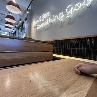 a person&apos;s feet on the counter