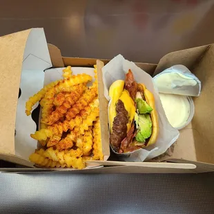 Spicy fries with ranch and avocado bacon cheeseburger