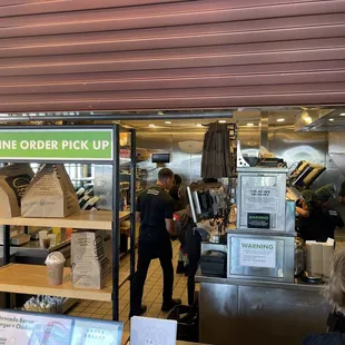 More Lazy employees and a manager ignoring customers.