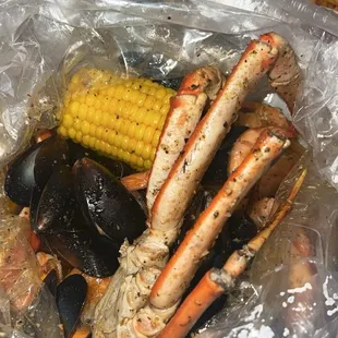 Mussels, corn, crab legs