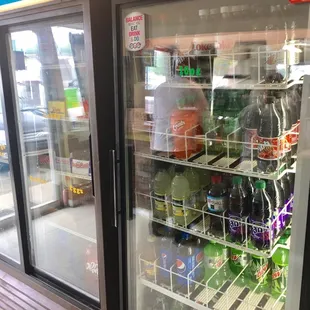 a refrigerated soda and soft drinks